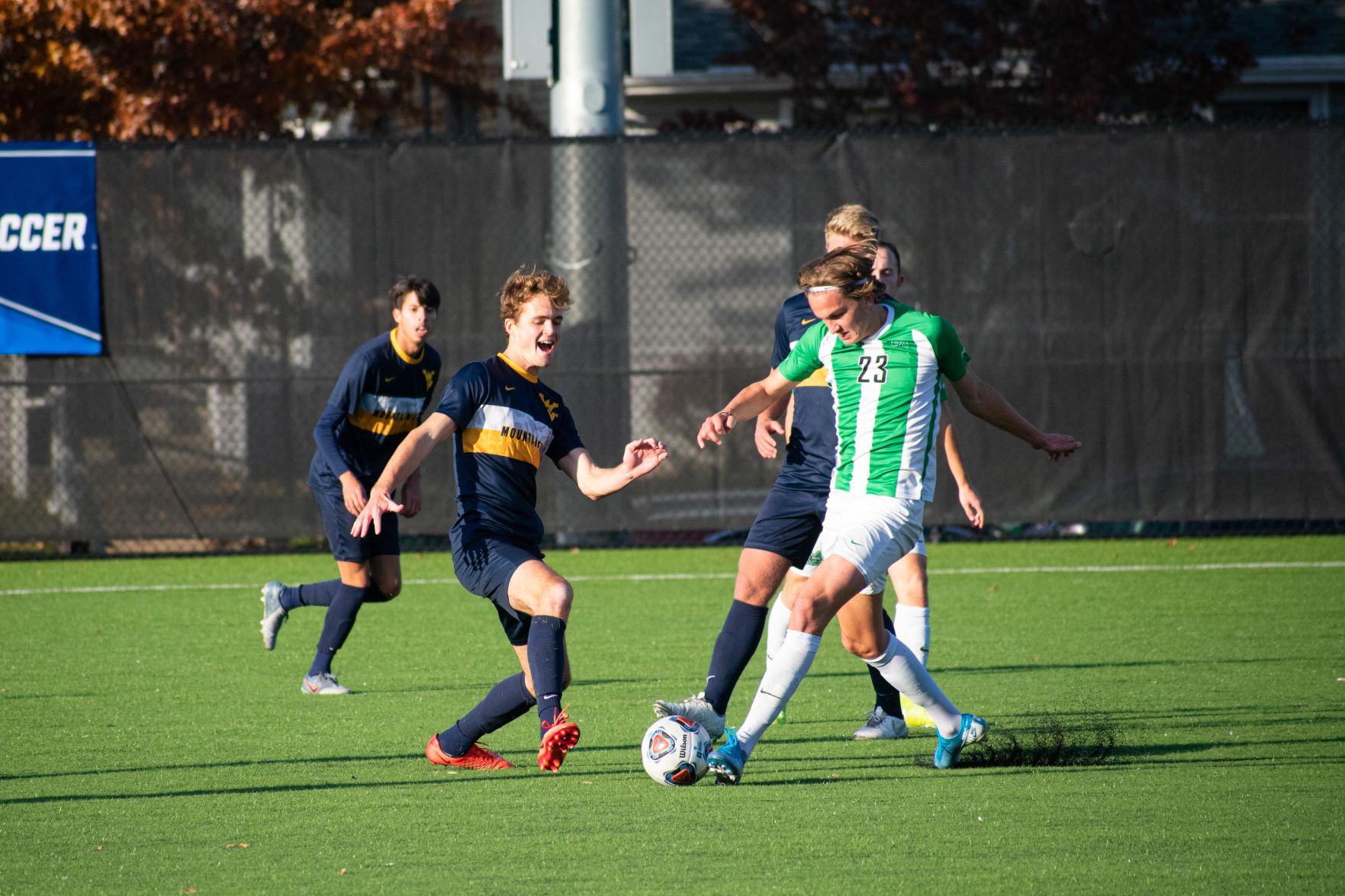 West Virginia defender Kevin Morris attempts to contain a Marshall player at Hoops Family Field on Nov. 24, 2019.